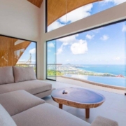 Enhancing energy flow in a modern Thailand home using SUNFLEX glass doors for a balanced Feng Shui design.