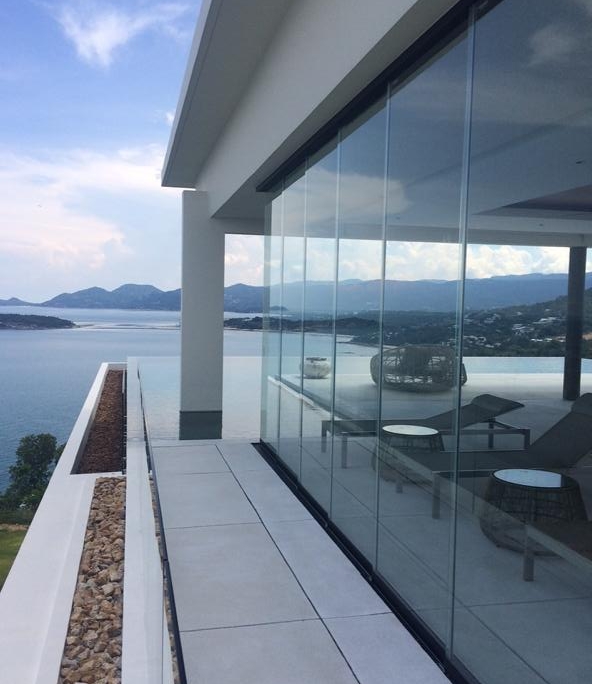 frameless-glass-balcony-enclosure-sf20 Frameless glass balcony enclosure using the Sunflex SF 20 sliding system