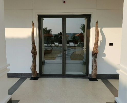 luxury-double-entrance-doors-aluminum-sf45 Elegant SUNFLEX SF 45 aluminum double entrance doors for a luxury villa or hospitality entryway.