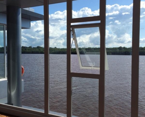 open-awning-window-aluminum-frame-sf45 Open SF 45 aluminum awning window allowing natural ventilation while protecting against light rain.