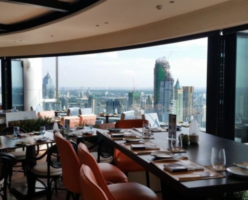 Framed SF 25 slide and turn system installed in a Bangkok skyscraper restaurant for a panoramic view.