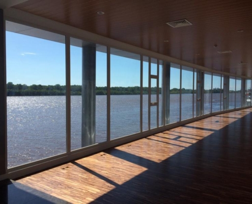 sf45-aluminum-window-system-tropical-resort SUNFLEX SF 45 aluminum window system providing seamless views and weather protection for a tropical resort.